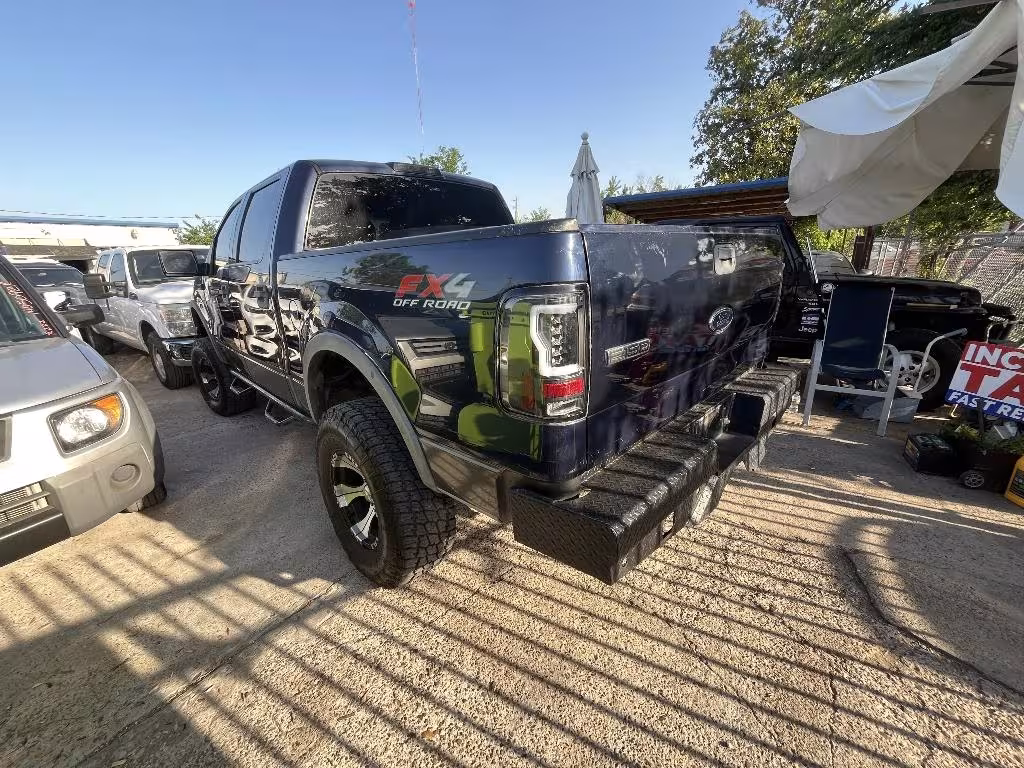 2004 Ford F-150 - 1FTPW14584KC16116 - Image #1