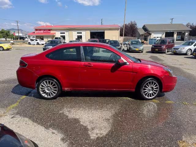 2009 Ford Focus - 1FAHP33NX9W145893 - Image #4