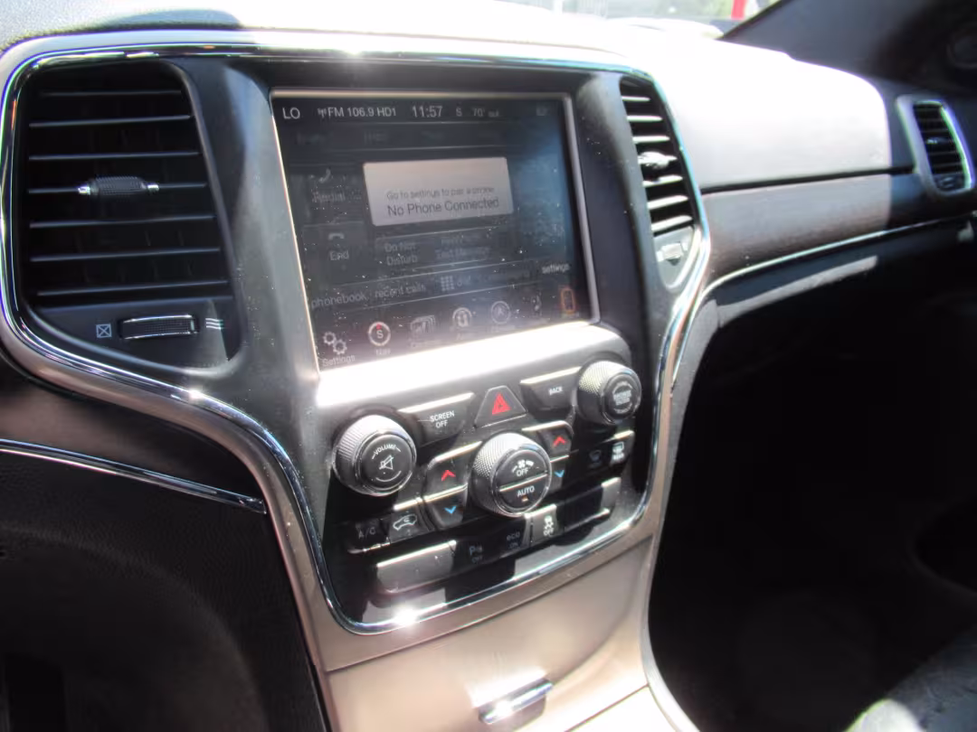 2015 Jeep Grand Cherokee - 1C4RJFBG7FC653854 - Image #4